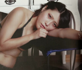 Utami Hayashishita flaunting her thick, bulky body in a sexy black bikini, pure temptation from the Marigold Official Fan Book May 2024 bikini shoot